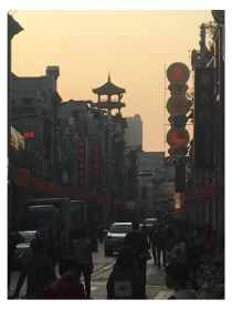 Colour photo of downtown Guangzhou at sunset.