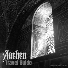 Digital Illustration for the Aachen Travel Guide, using graphic elements, textures, text, and a black and white photo of the Aachen Cathedral.