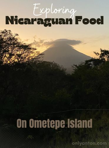 Cover for "Exploring Nicaraguan Food on Ometepe Island, using textures, text, and the author's photo of a volcano at sunset on Ometepe Island.