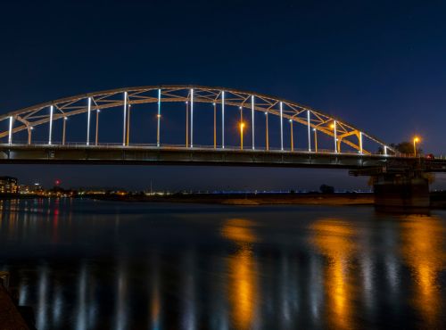 Photo of the Wilhemina Bridge in Deventer by Canva. “The Wilhemina bridge at the river IJssel” by Nisangha from Getty Images/Canva.